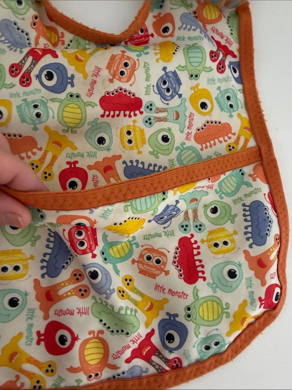 Kids Orange Trim Baby Bib with Colorful Monster Print